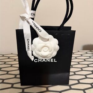 Chanel Black paper bag with White Accents, small good condition
